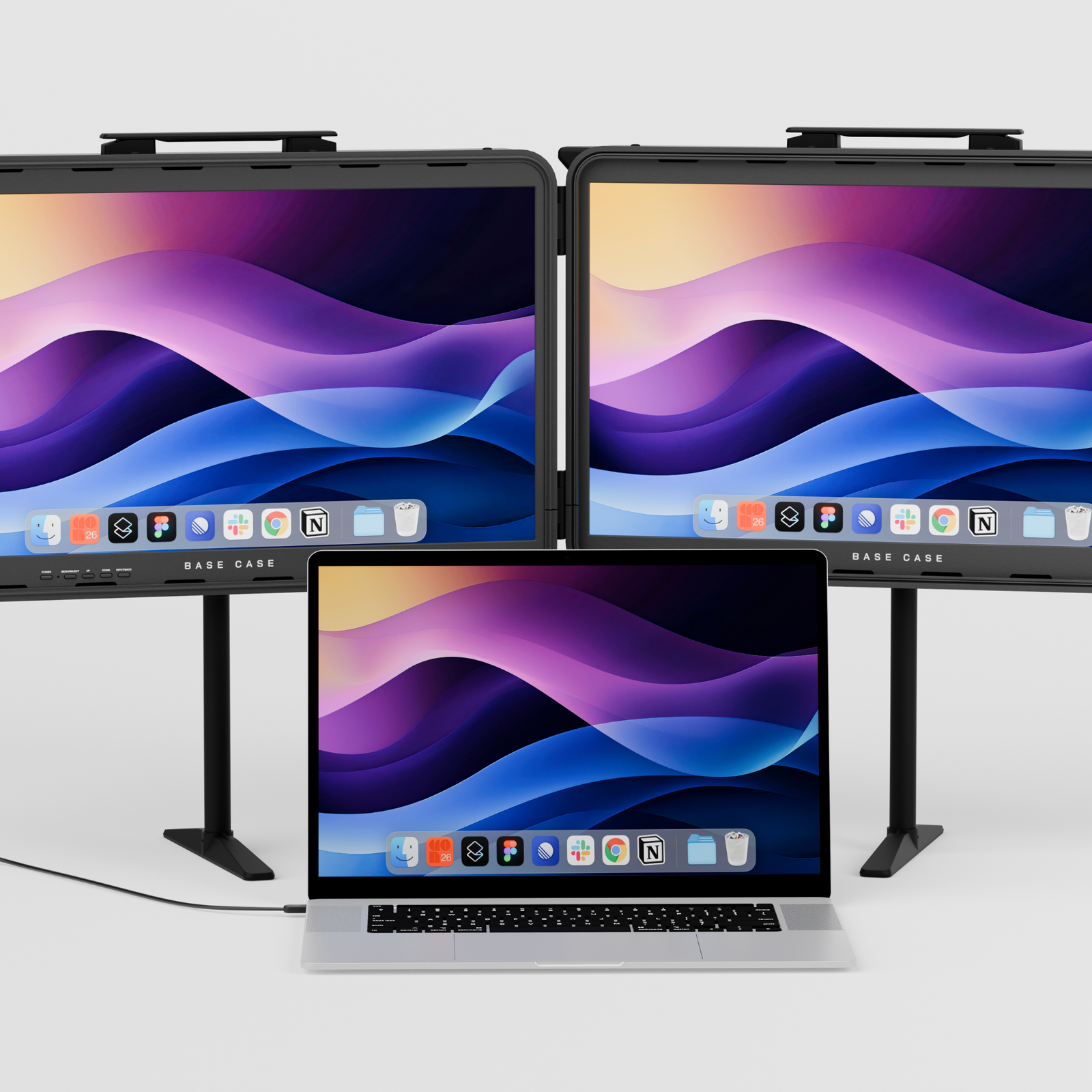 Telescoping legs lift the displays clear of the laptop